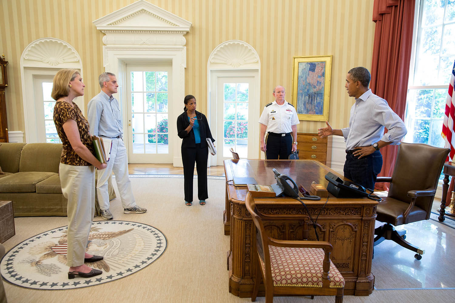 President Barack Obama discusses the situation in Syria with senior advisors in the Oval Office with Karen Donfried on the left. Source: Obama White House / Flickr