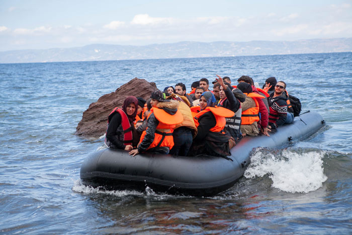 Syrische bootvluchtelingen komen aan op het Griekse eiland Lesbos