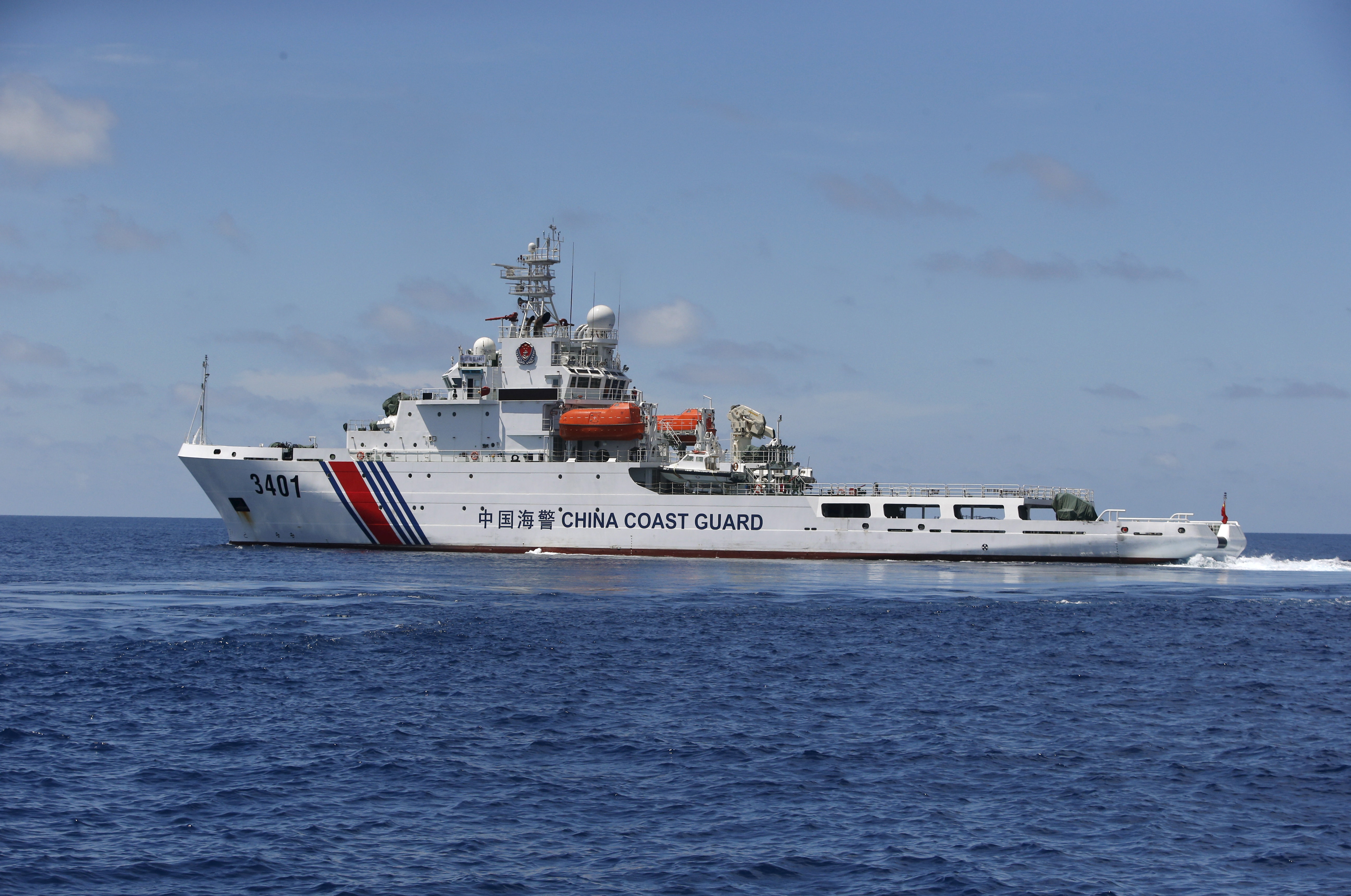 A Chinese Coast Guard vessel on the disputed Second Thomas Shoal, part of the Spratly Islands, in the South China Sea on 29 March 2014. © Erik De Castro via Reuters